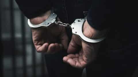 Person being arrested by police in New Jersey”