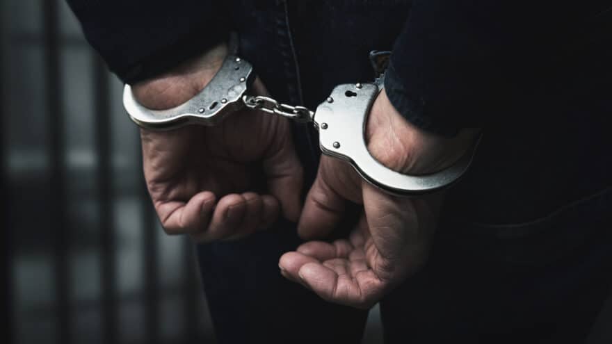 Person being arrested by police in New Jersey”